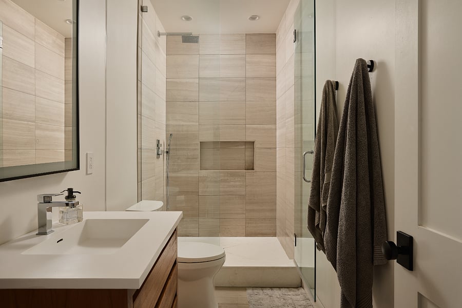 Bathroom 2: Accessible from the hallway. Rain shower and handheld system.