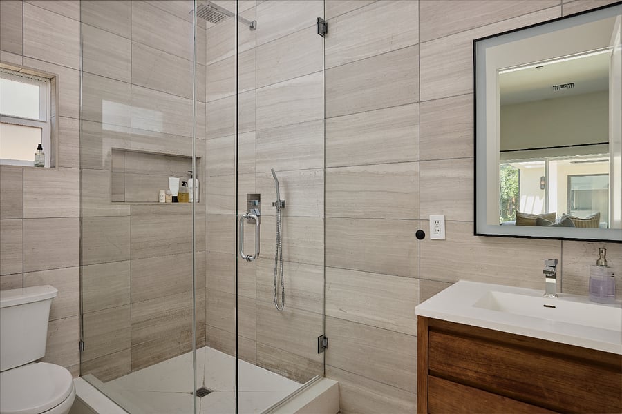 Bathroom 1: Privately attached to bedroom 1. Full rain shower and handheld shower system.
