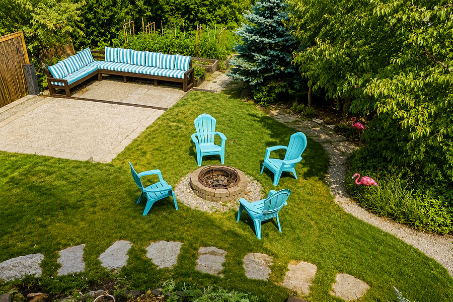 Expansive backyard with firepit, bench and plenty of space