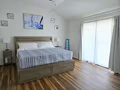 Master Bedroom (upstairs) with ensuite and direct access to upper deck.