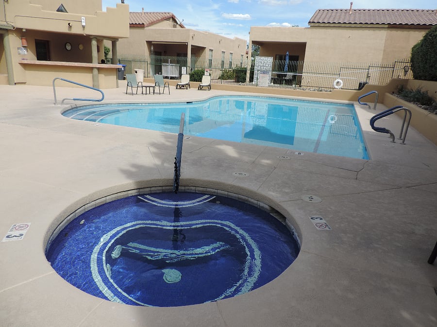 Neighborhood private pool and spa open in the spring and summer months.