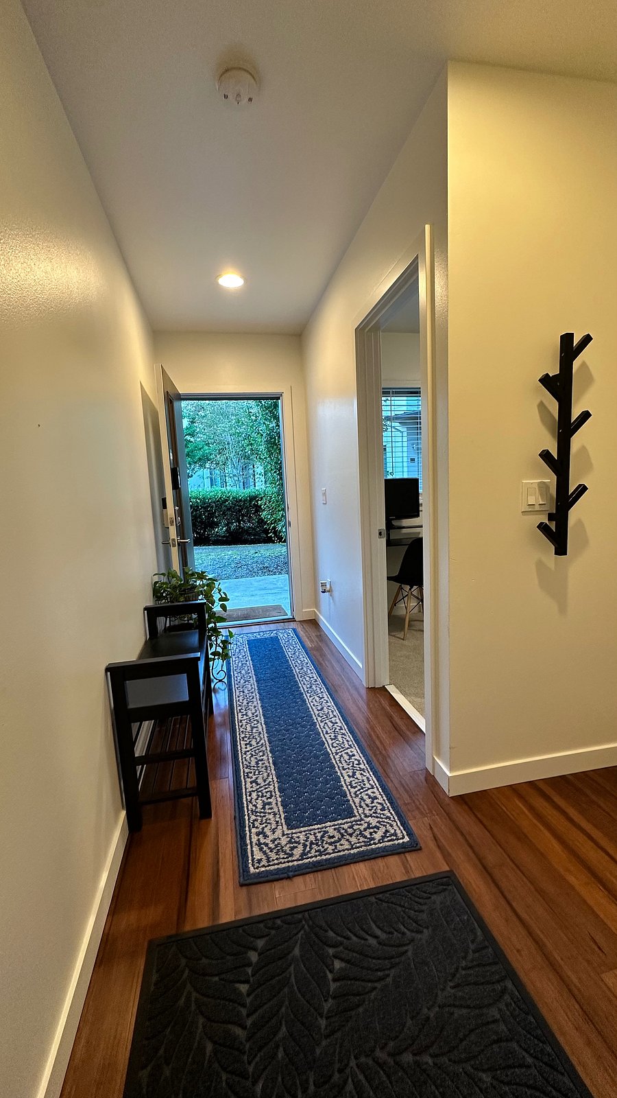 Entryway with downstairs bedroom