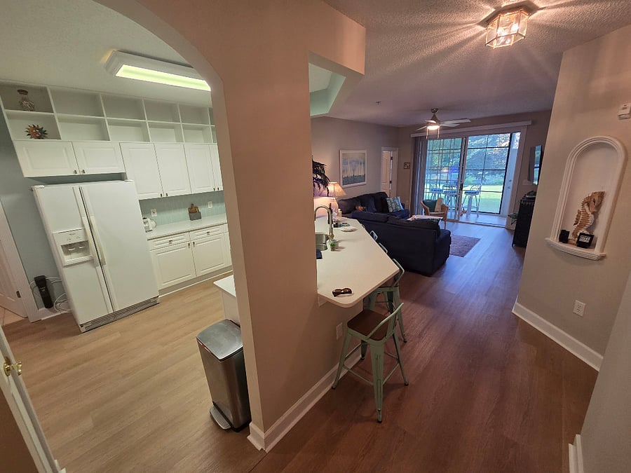 View of Kitchen and Living Room from Foyer