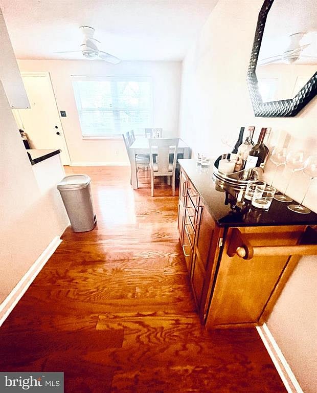 Gleaming Hardwood Floors and lots of Natural Sun light