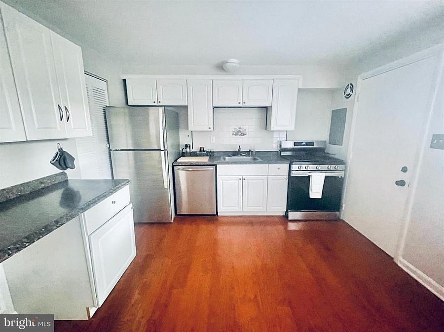 Open Kitchen with Granite Countertops and Stainless Appliances