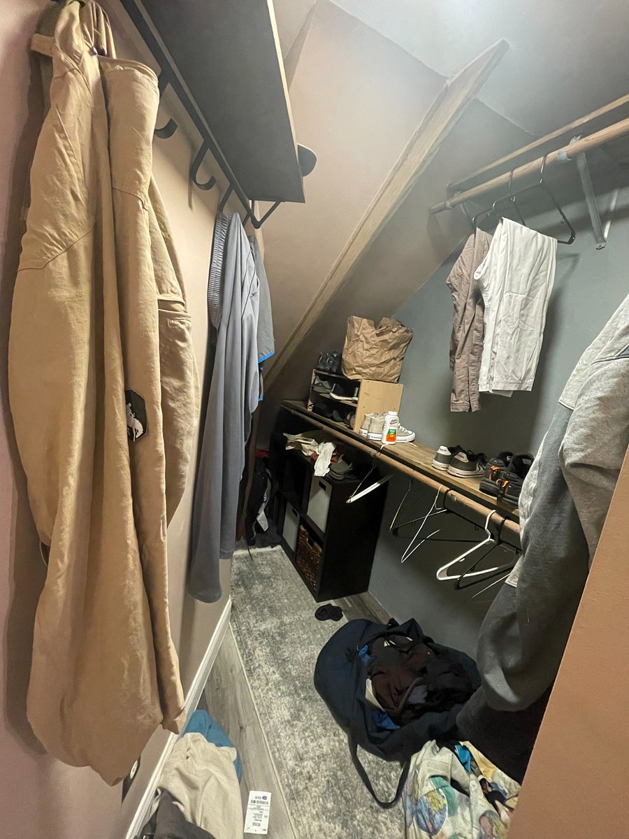 Downstairs private closet under stairs