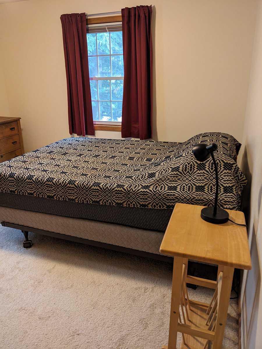 Private bedroom with room darkening curtains and comfy queen foam bed.
