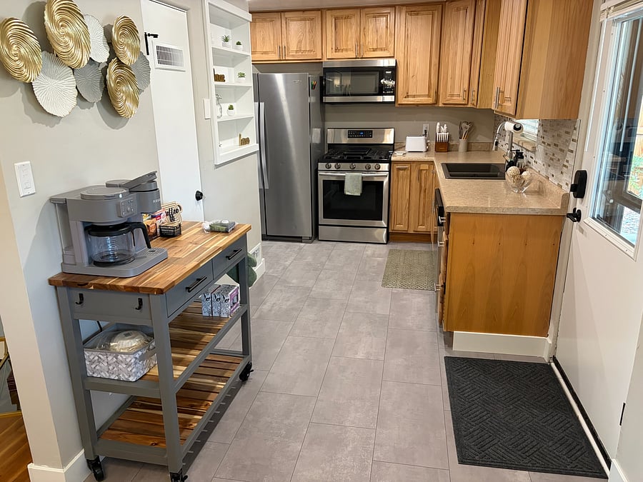 Open kitchen with ample storage and brand new dishwasher. All utensils and small appliances provided. Let us know if you are missing anything!
