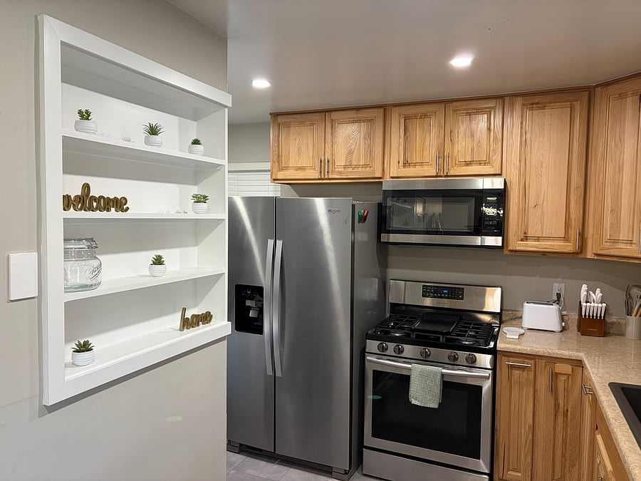 Gas range and soft close cabinets.