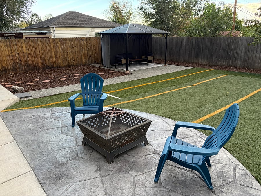 Wood burning fire pit with two starter packs of wood provided.