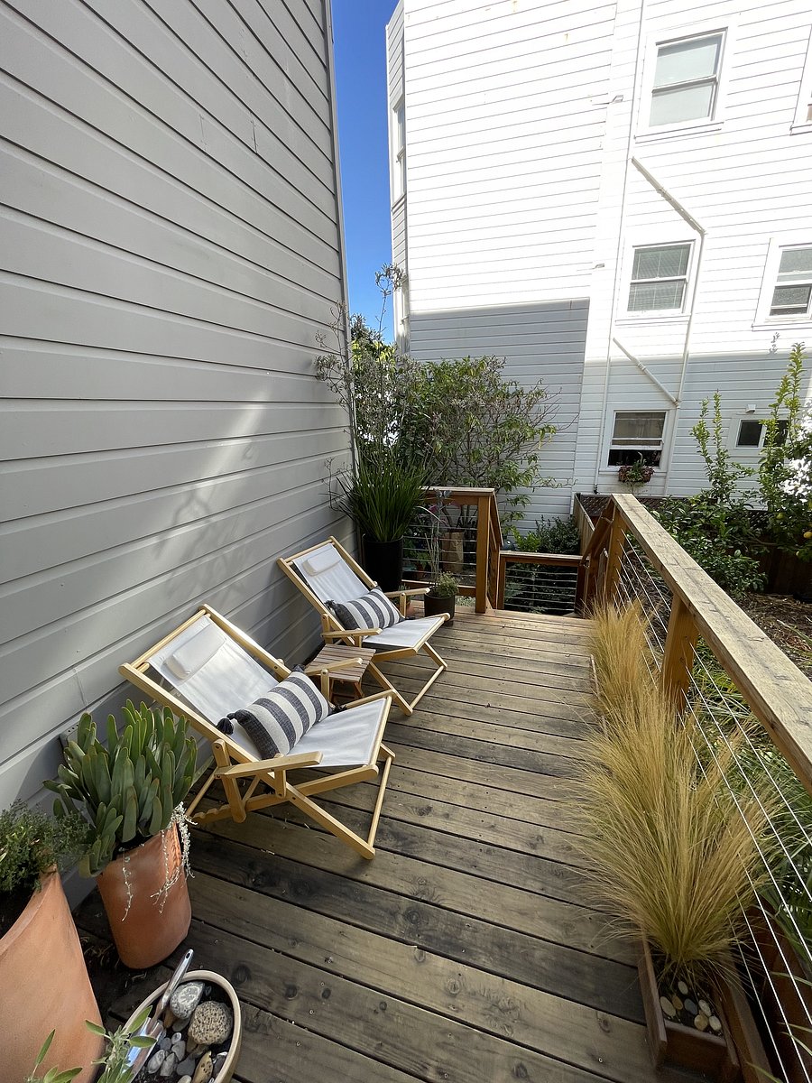Sunny deck with chairs for your use and enjoyment. We maintain the plants