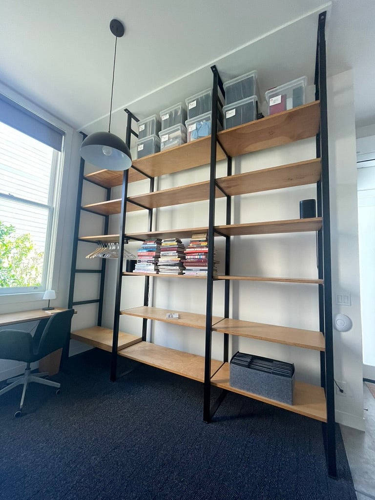 Work station overlooking garden with fast and reliable WiFi or ethernet. Floor to ceiling shelving unit provides ample storage for clothes, shoes, books, extra pantry items, laundry basket, suitcases. Connect to Sonos speakers.