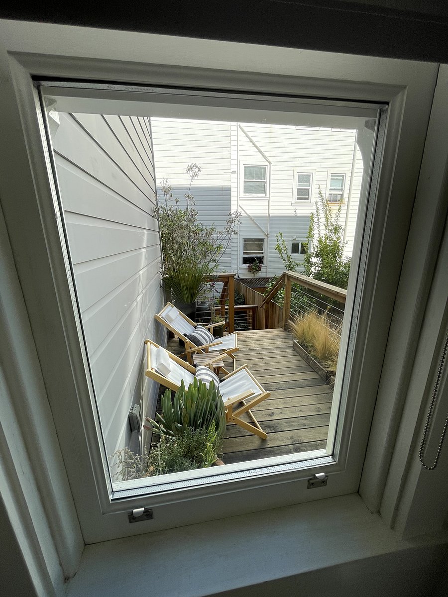 View from the kitchen window to private deck area.