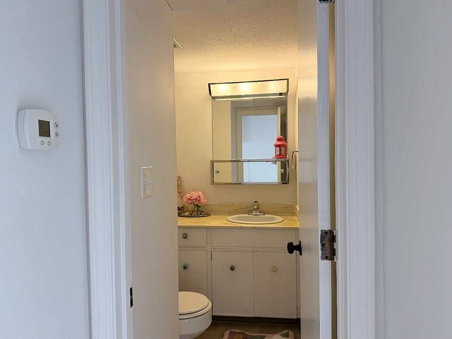 Half bath next to the kitchen.