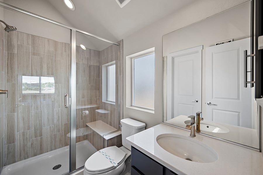 Private full bathroom with a spacious walk-in shower.