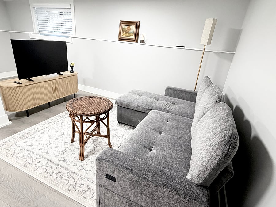 Sleeper sofa with USB port in lower level living room