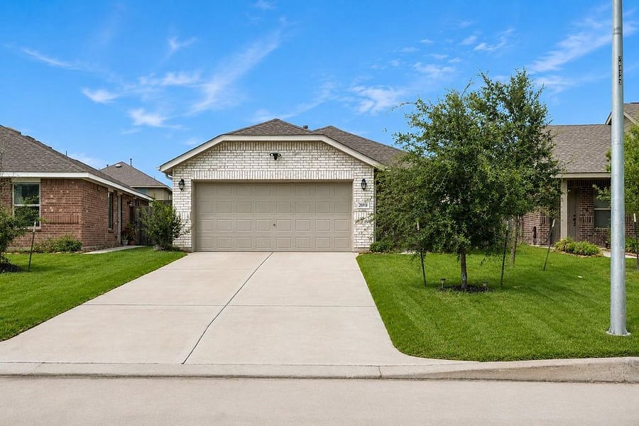 2 car garage and additional parking in driveway.