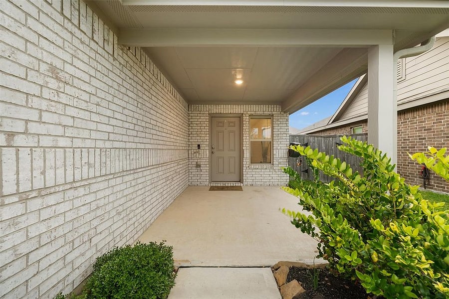 Large front porch perfect for relaxing.
