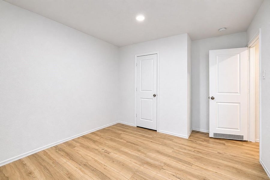 Third bedroom view from corner.