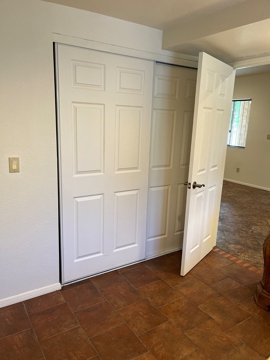 Bedroom #1 closet adjacent to bathroom and kitchen