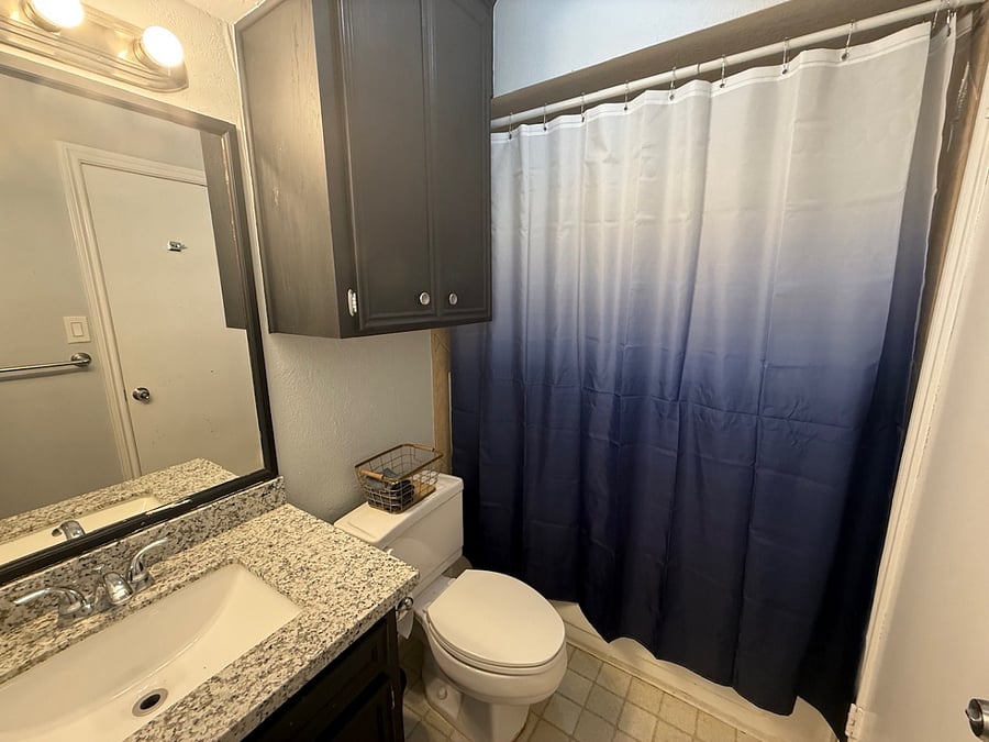 En suite bathroom for primary bedroom