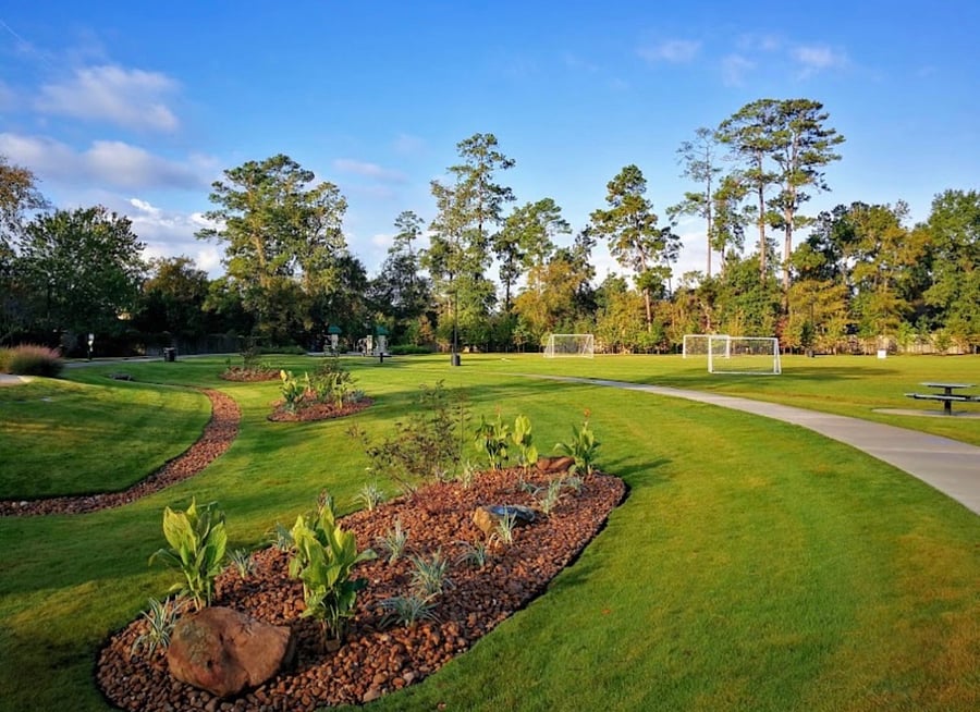 Steps away from park with walking path and sports fields 