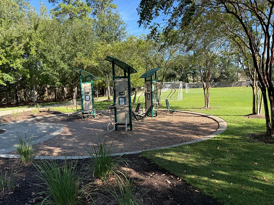 Steps away from park with exercise equipment 