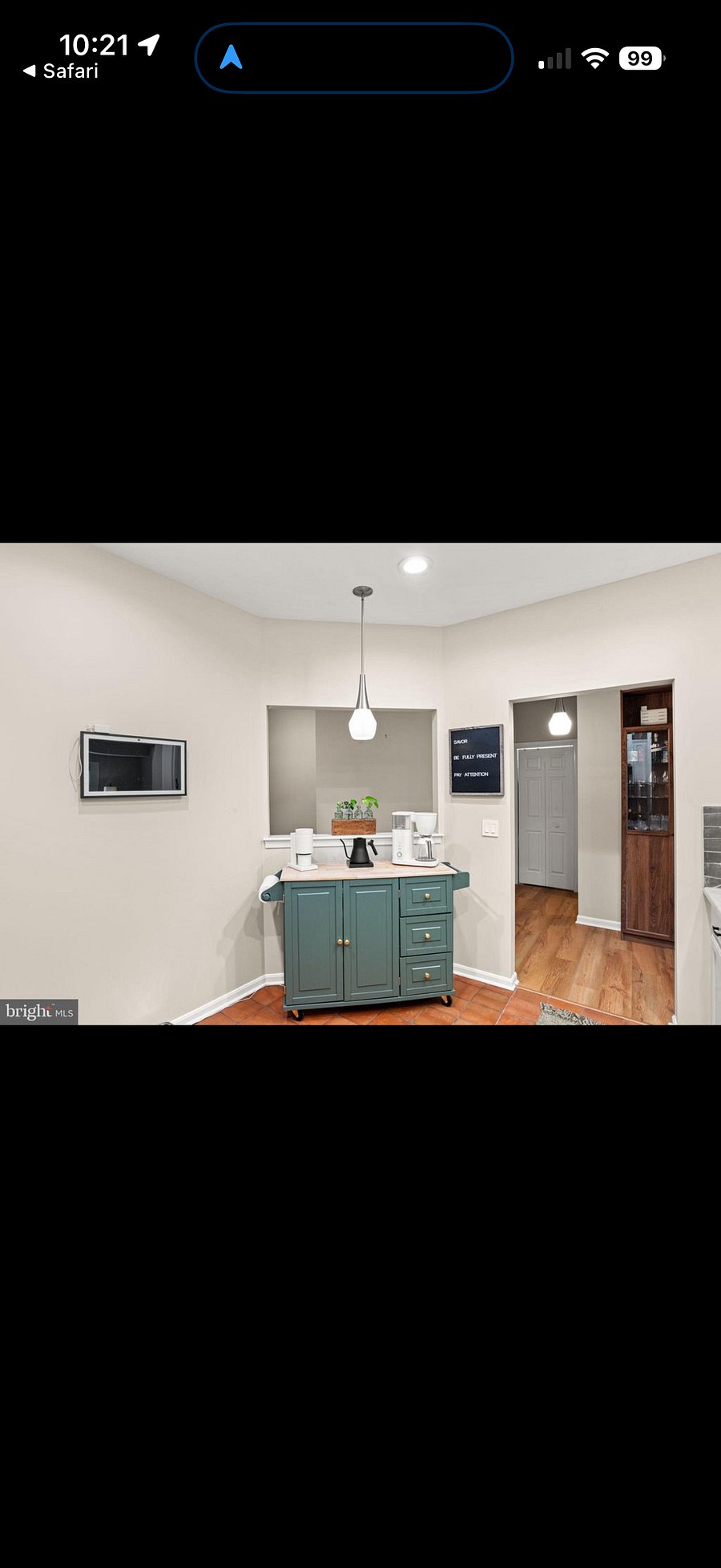 Separate island space in kitchen for storage and coffee/tea making