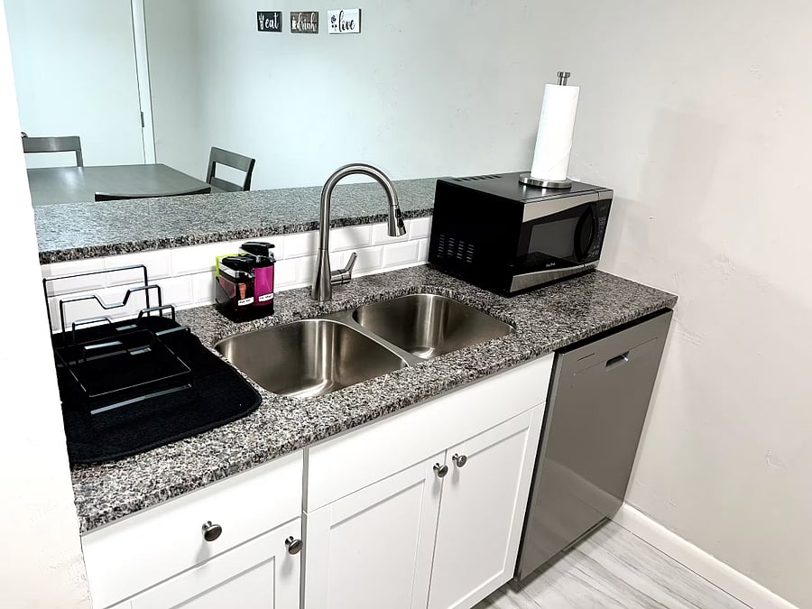 Fully stocked kitchen, completely ready to cook your first meal w/ dishwasher and microwave.