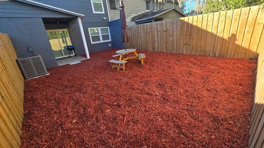 Privately fenced backyard w/ picnic table and grill. Yard maintenance included in rent.