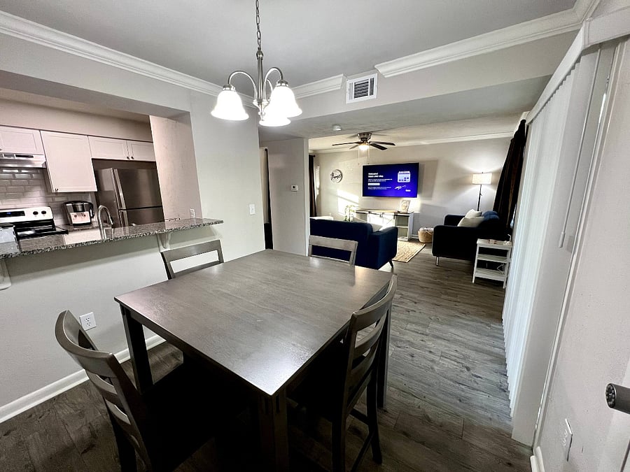Dining area w/ preview of living room and kitchen