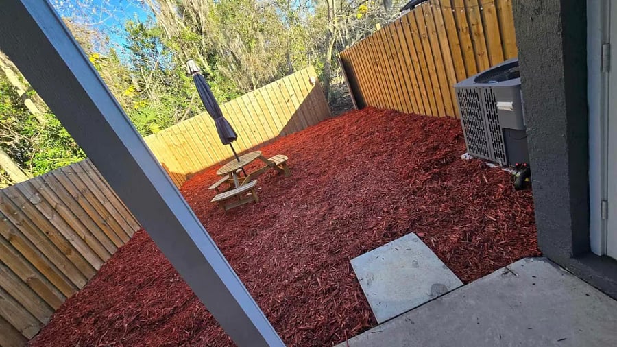 Privately fenced backyard w/ picnic table and grill. Yard maintenance included in rent. Back gate can be locked for safety!