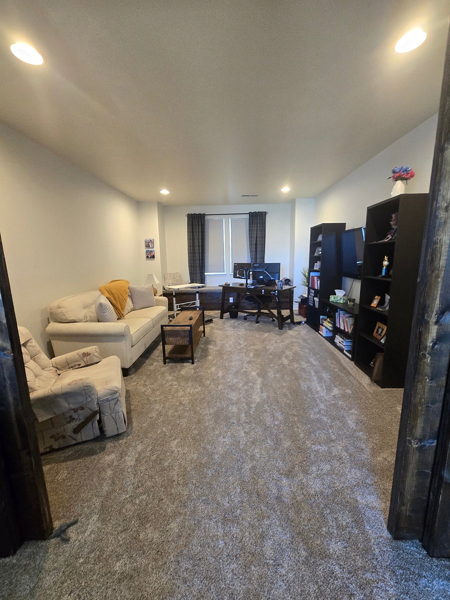 Upstairs loft space that nobody uses. A nice space to unwind. Doors close.