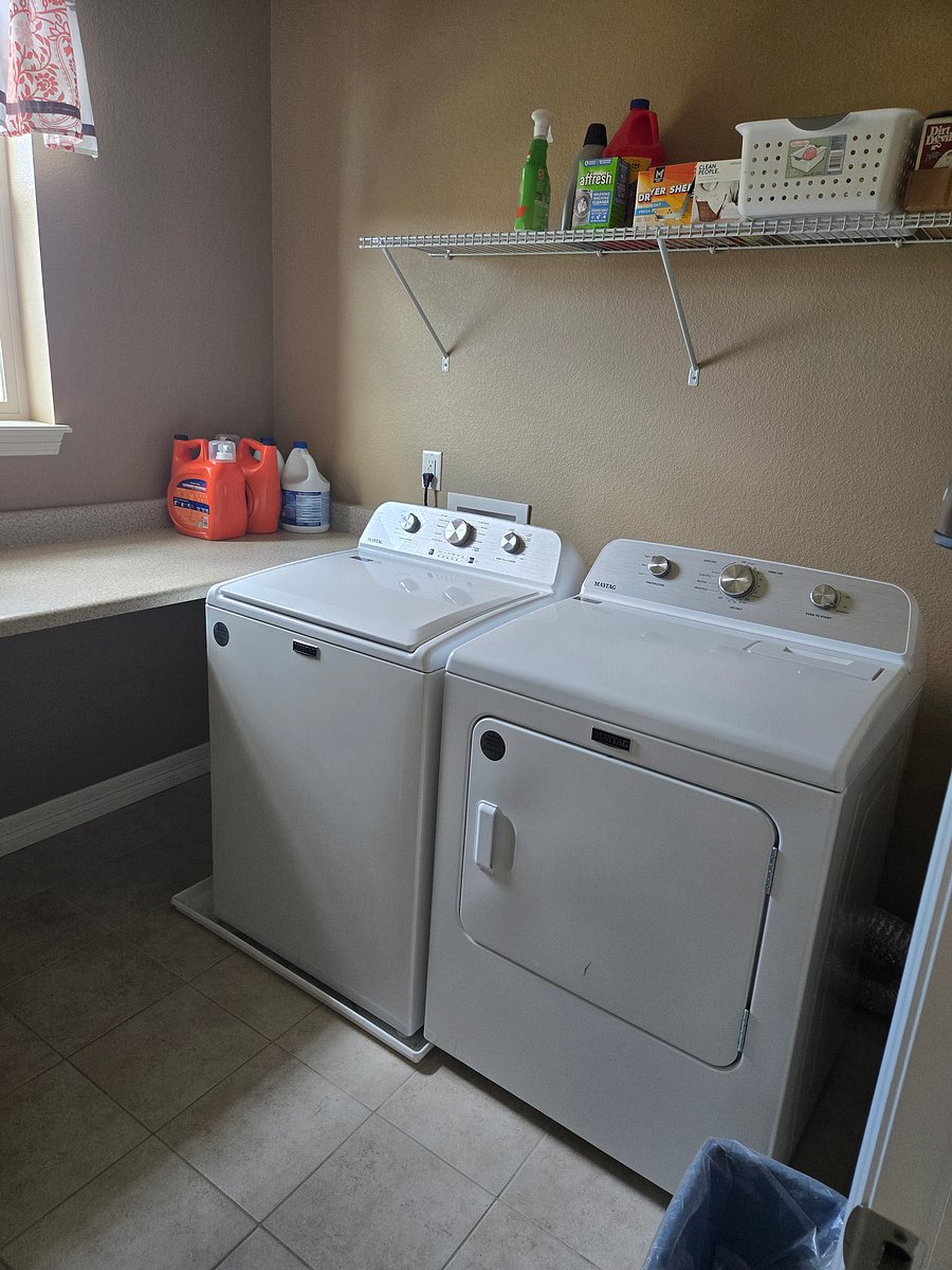 Shared washer and dryer.