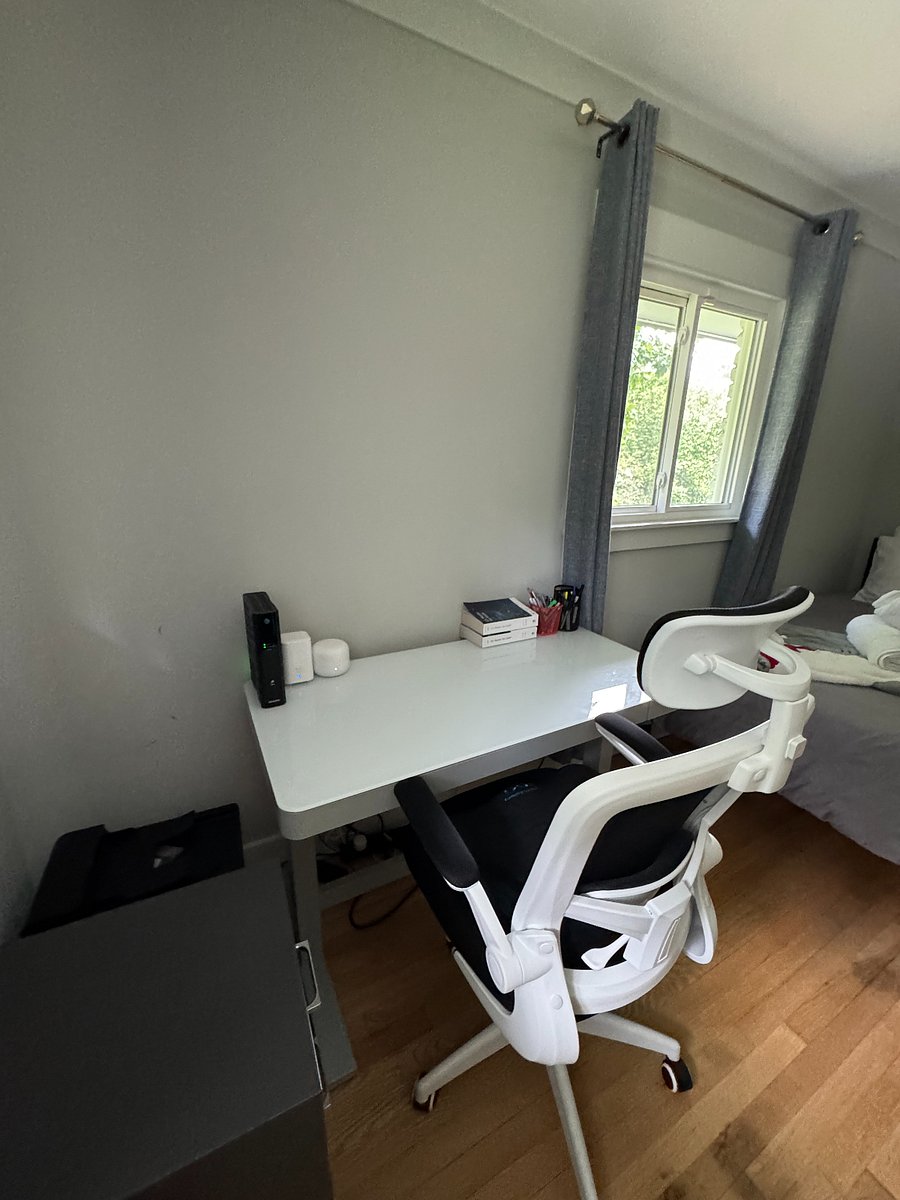 Sit/stand desk with gaming chair