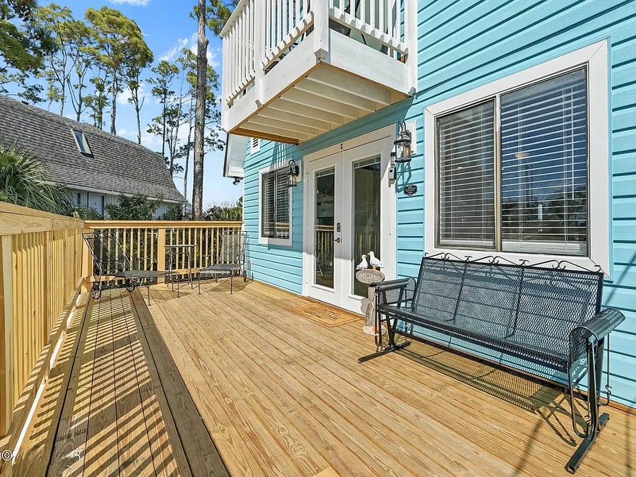 Private second-floor balcony - perfect for morning coffee or relaxing in the coastal air.
