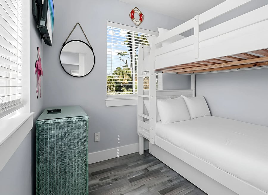 Second private bedroom with full-over-full bunk bed. Two full-size sleeping surfaces - ideal for family or shared accommodations