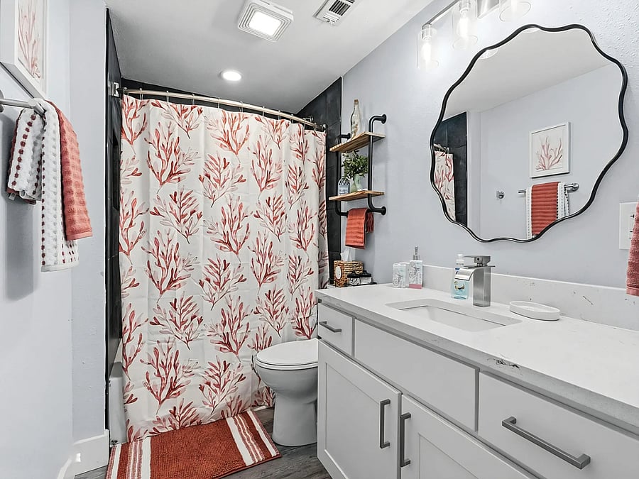 Private full bathroom with storage for extended stays