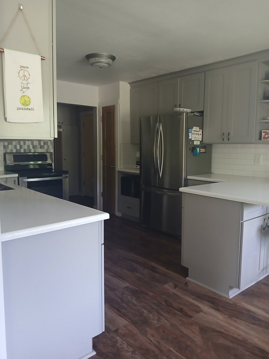 Kitchen from Family Room, stainless steel appliances including a dishwasher