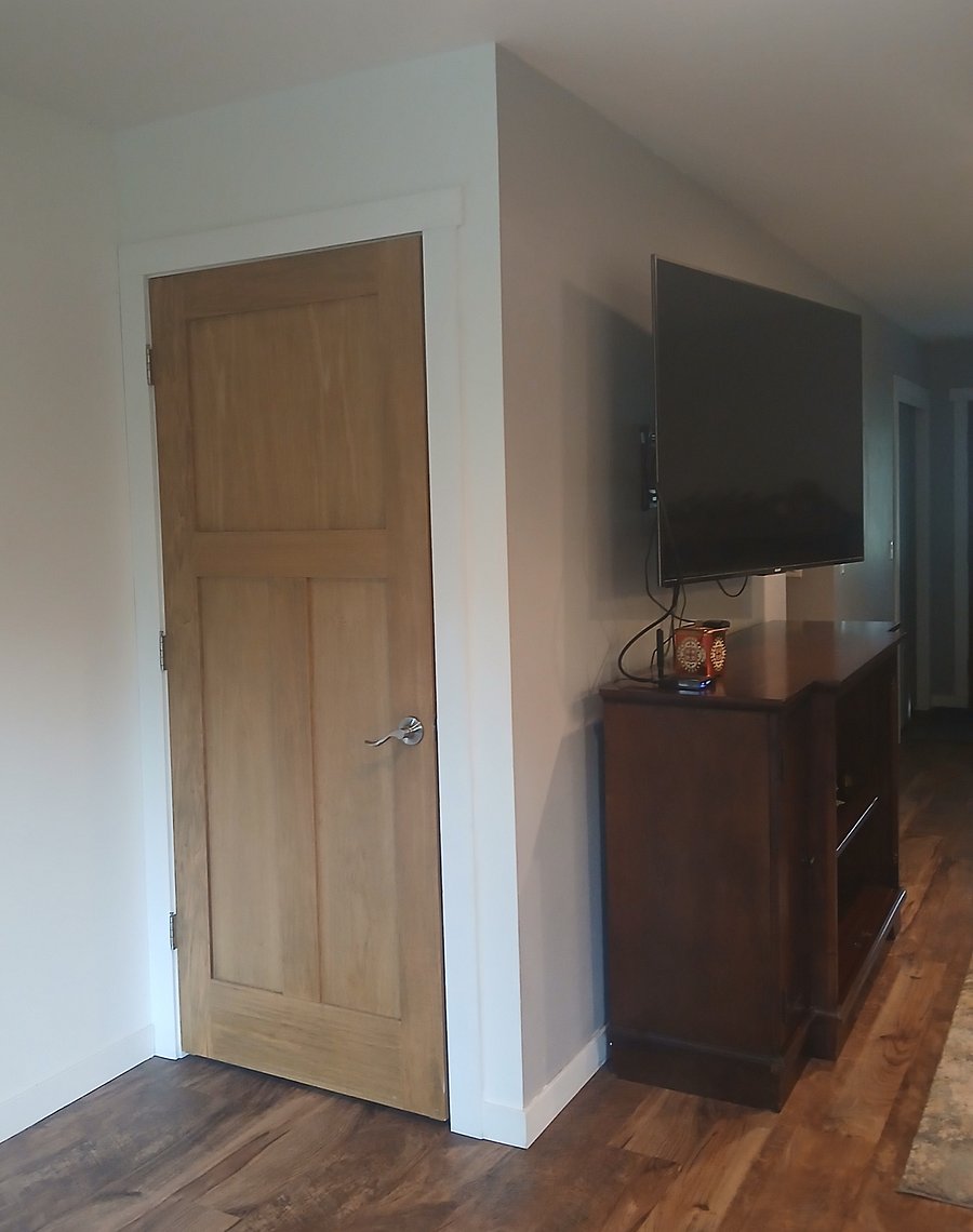 Door to basement from Family Room. Basement has an infrared sauna available to guests.