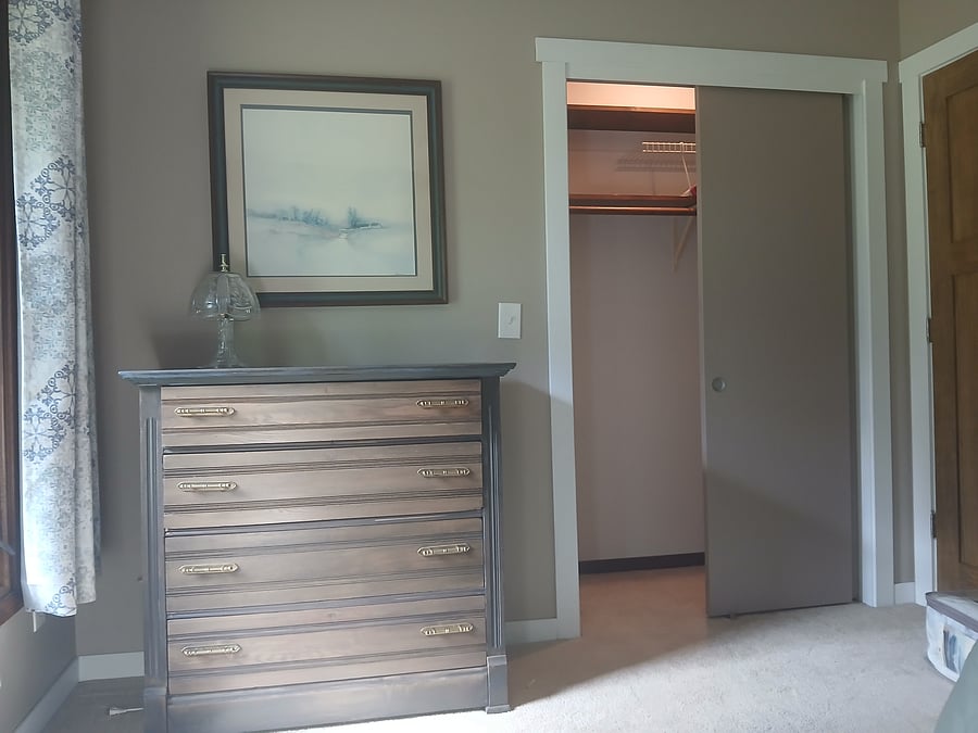 Dresser in third bedroom, all closets have lights.