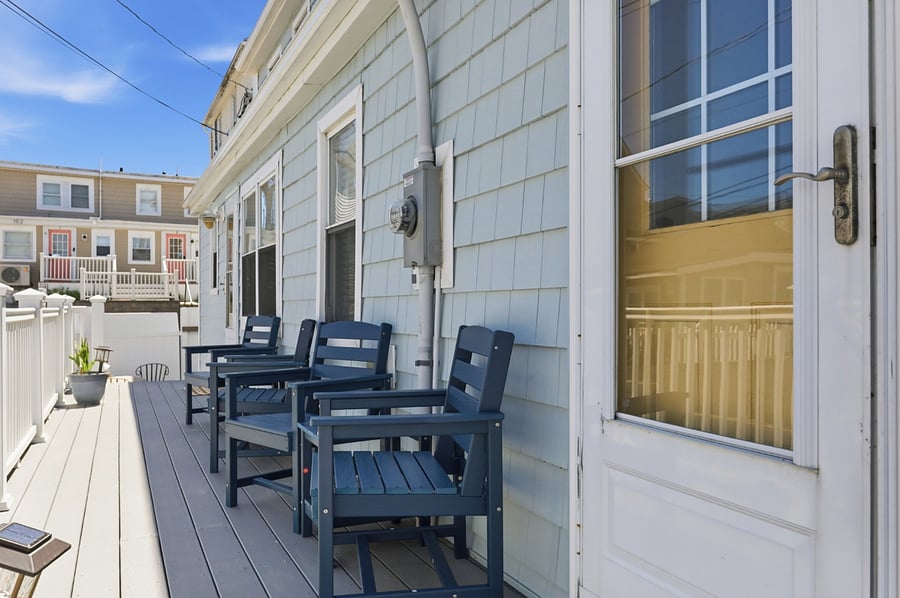 Polywood tables and chairs on deck and small seating area
