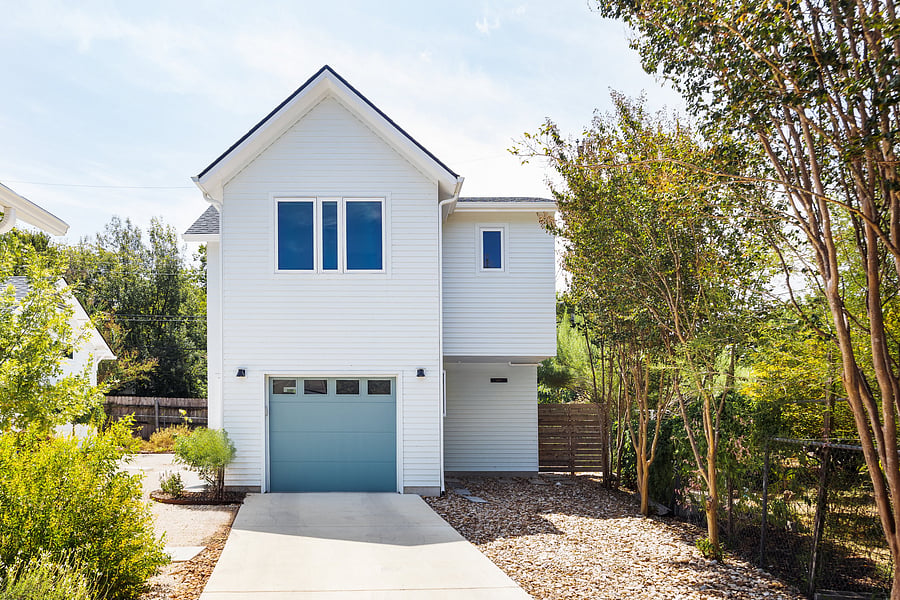 Front view of the garage apartment. The entire top floor is the rental unit. Private parking space and entry to the right of shared driveway. The bottom floor of the garage is not included in the rental lease.