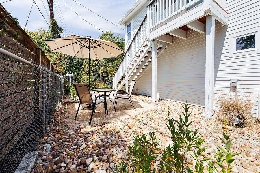 Private, fenced yard, with gated entrance. Yard maintenance included in rent.