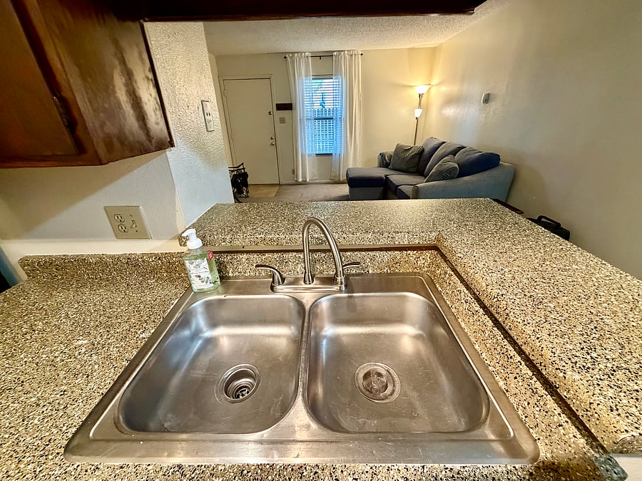 Stainless steel Sink with hot & Cold water faucet.