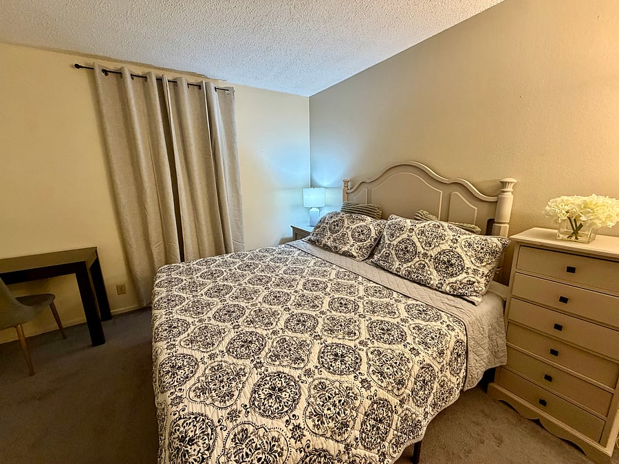 blackout Curtain installed. King Size Bed and Mattress with waterproof sheet included . Pillows, Linens and Bed sheets I recommend you bring your own for Sanitary reasons.