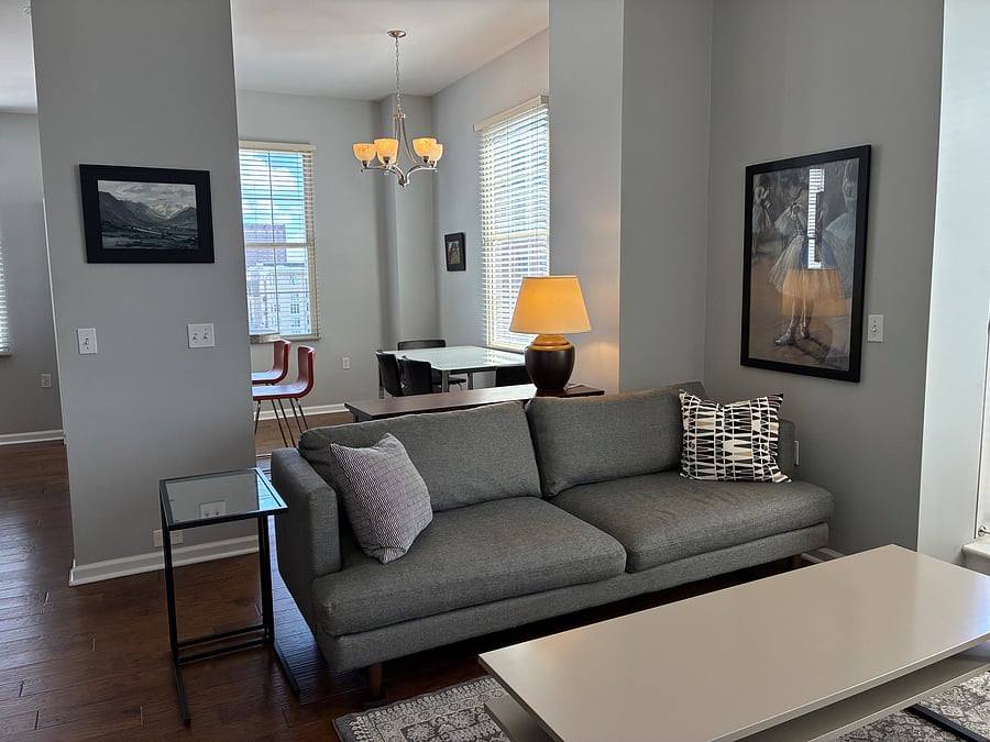 Living room open to dining area and kitchen.