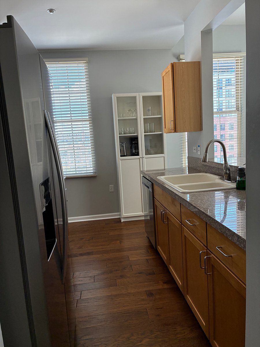 Water in door, side by side refrigerator. Extra storage in kitchen.
