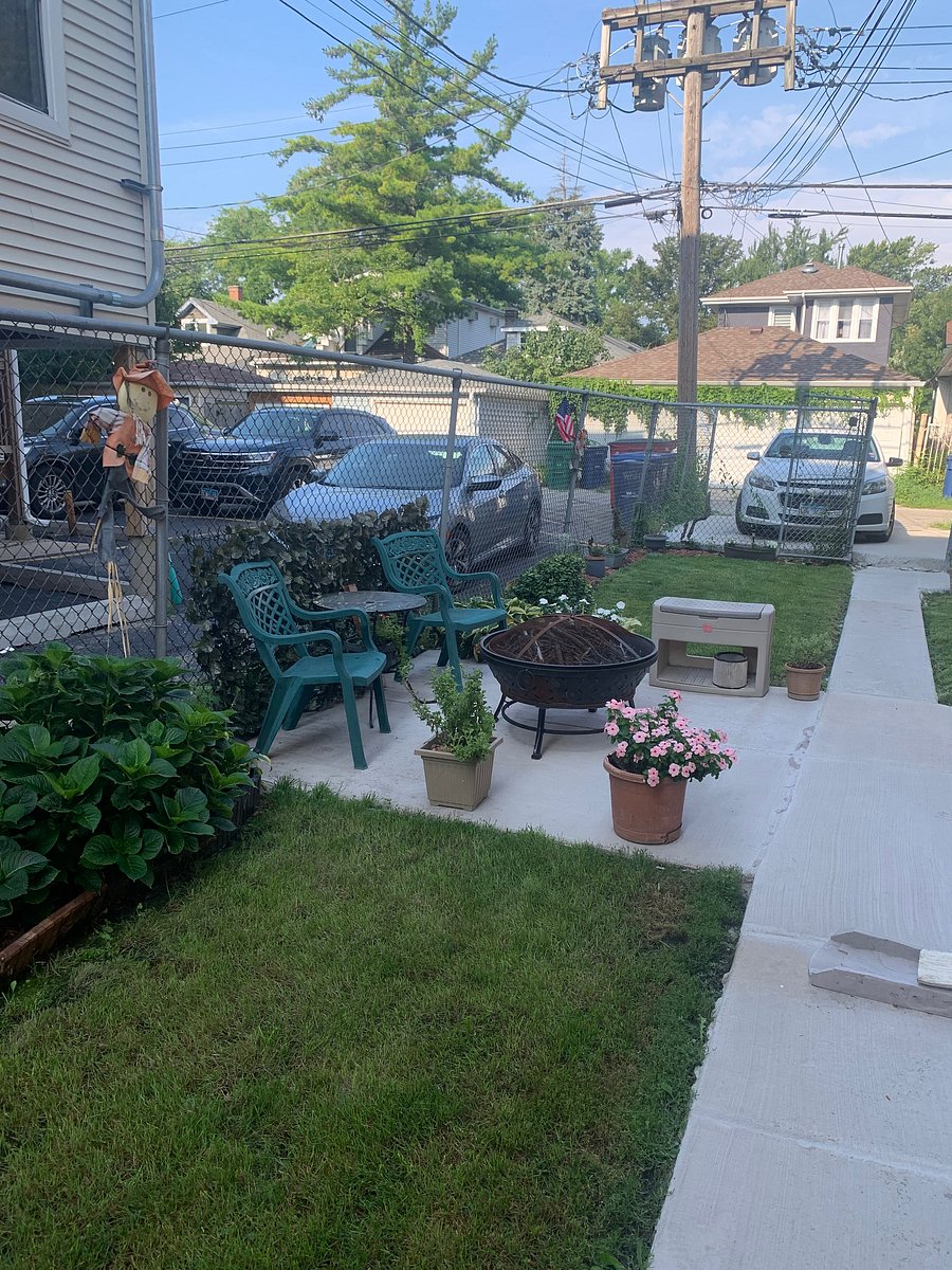Backyard patio with designated car space right in the back where there is entry into the back stairs leading up to back porch and apartment. Very peaceful property with "young" helpful seniors on the first floor 