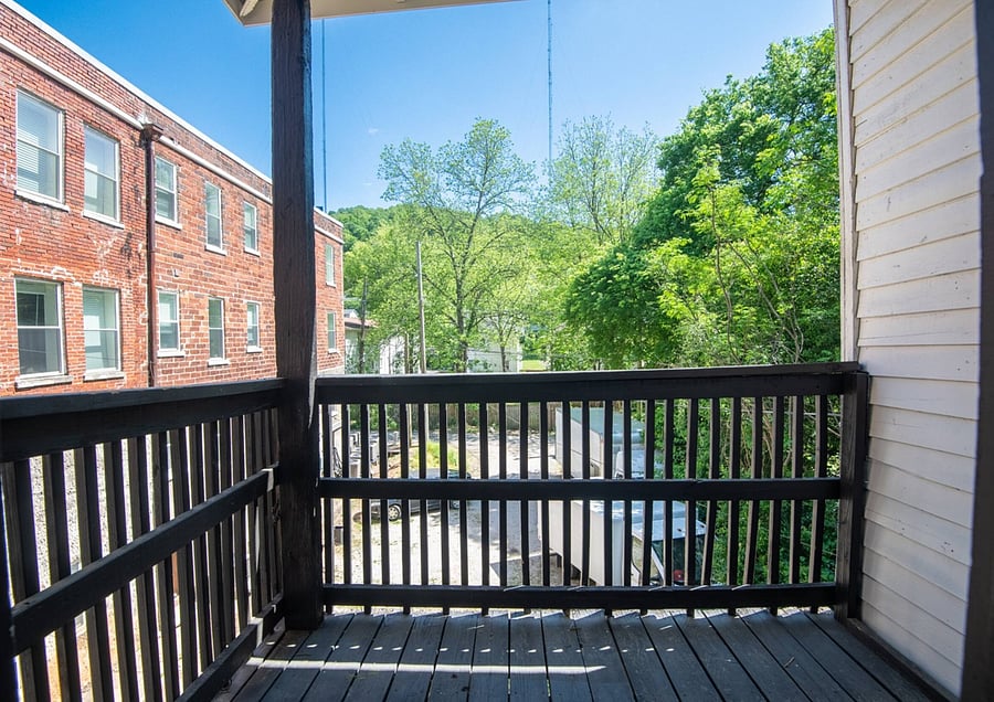 Pull up a chair and enjoy some quiet time on the back porch.